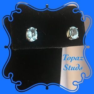 FACETED OVAL BLUE TOPAZ STUDS